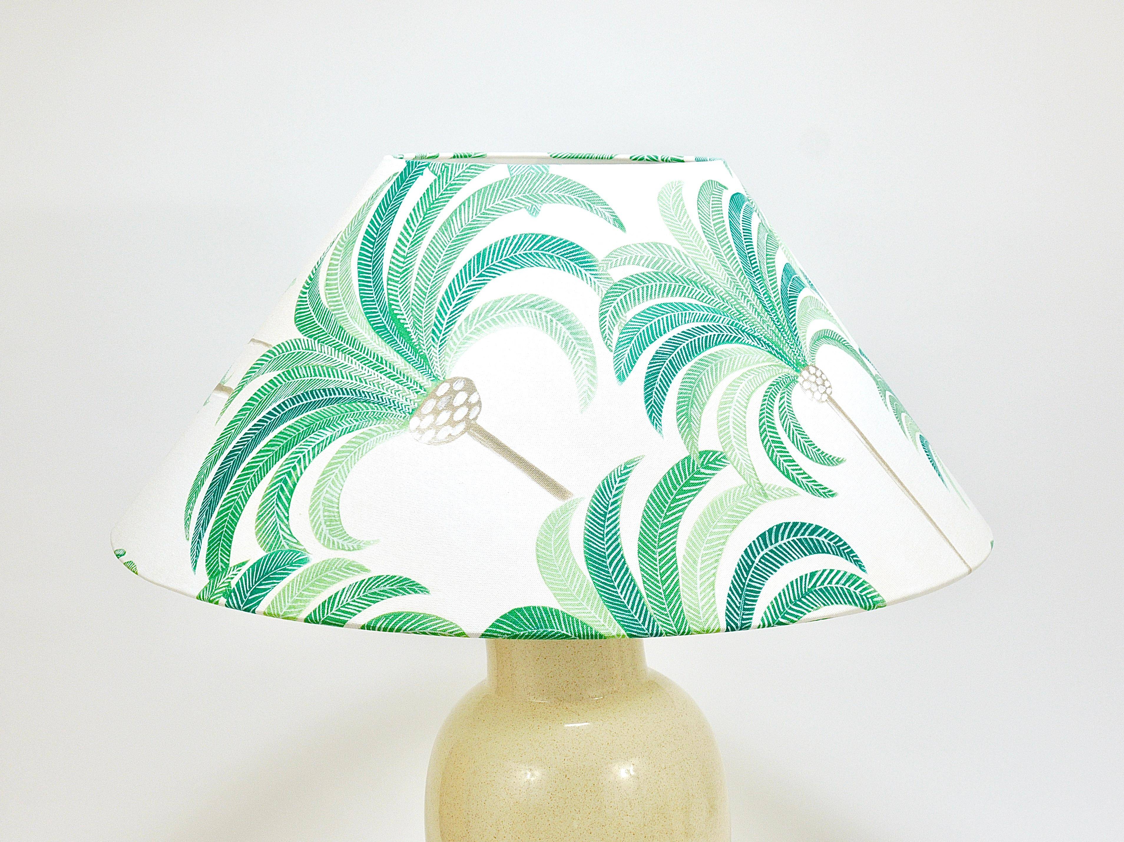 Pair of Tommaso Barbi Riviera palm tree table lamps from the 1970s with matching cushions.