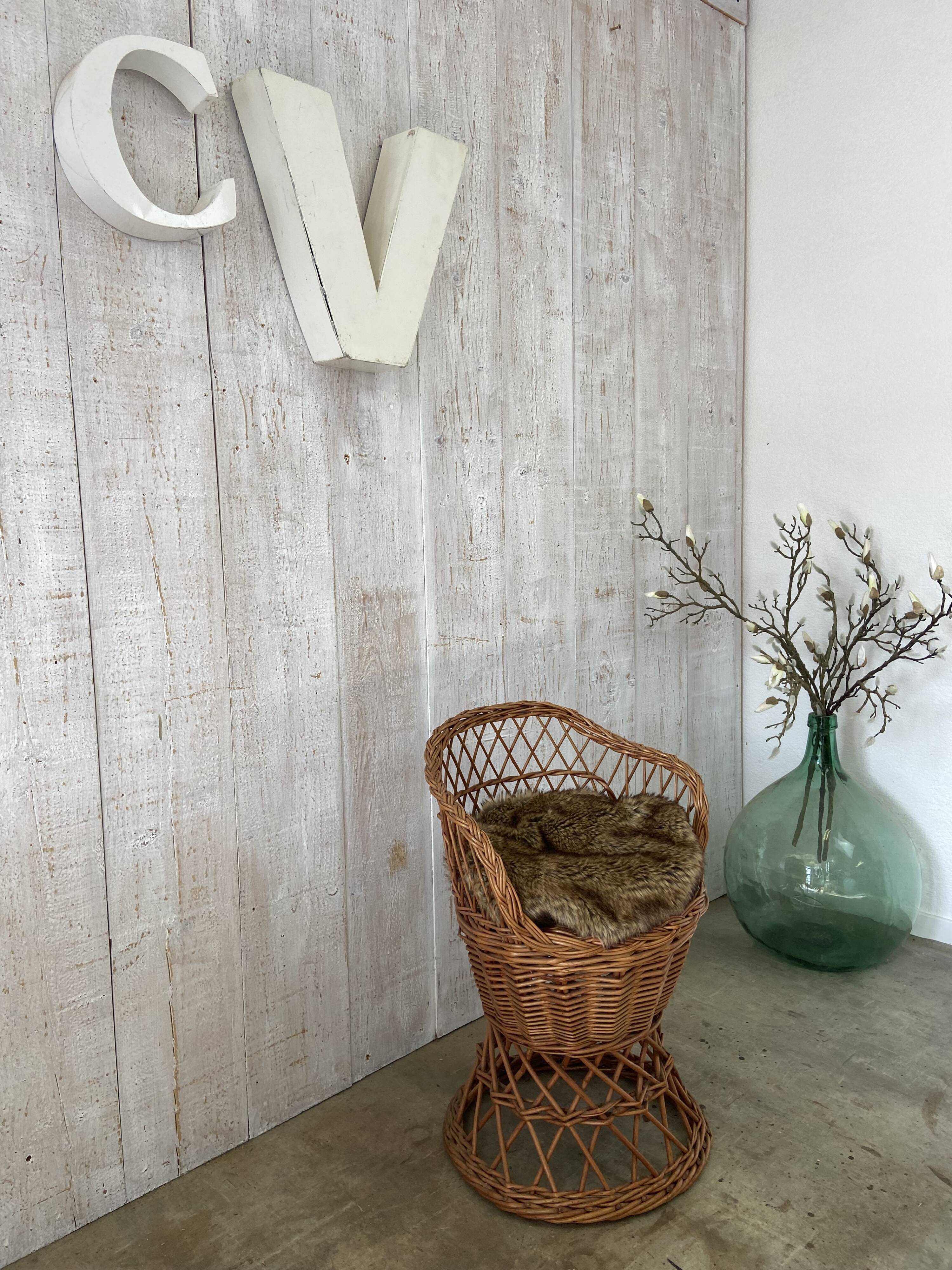 Vintage wicker children's armchair