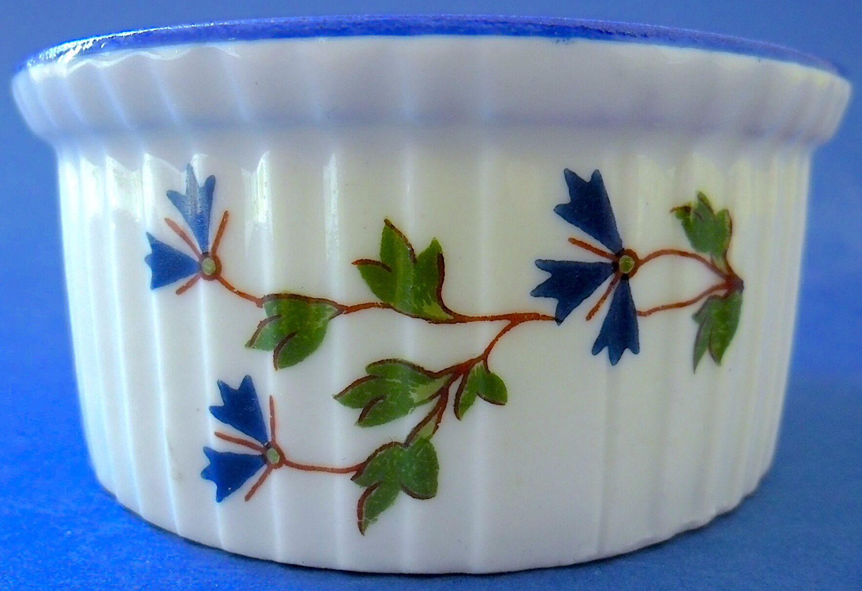 Suite of six porcelain ramekins decorated with barbels