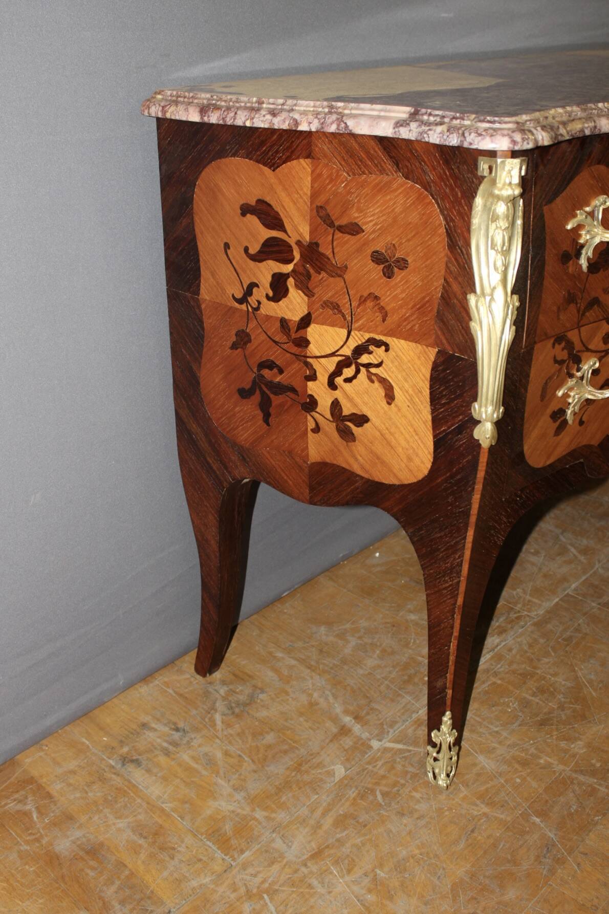 Louis XV style commode in marquetry from around 1930.