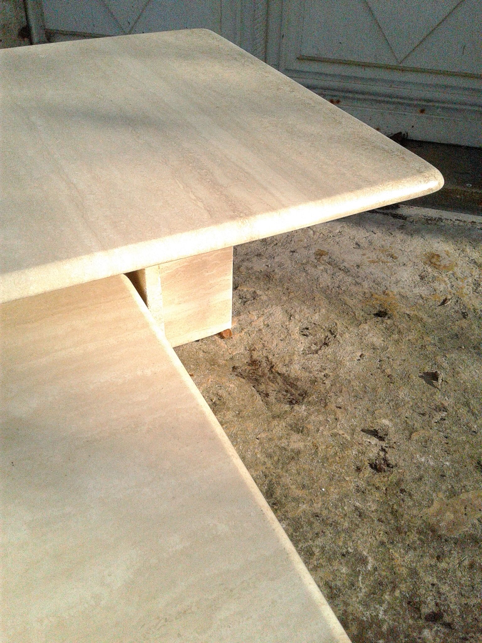 Two coffee tables giggle in travertine