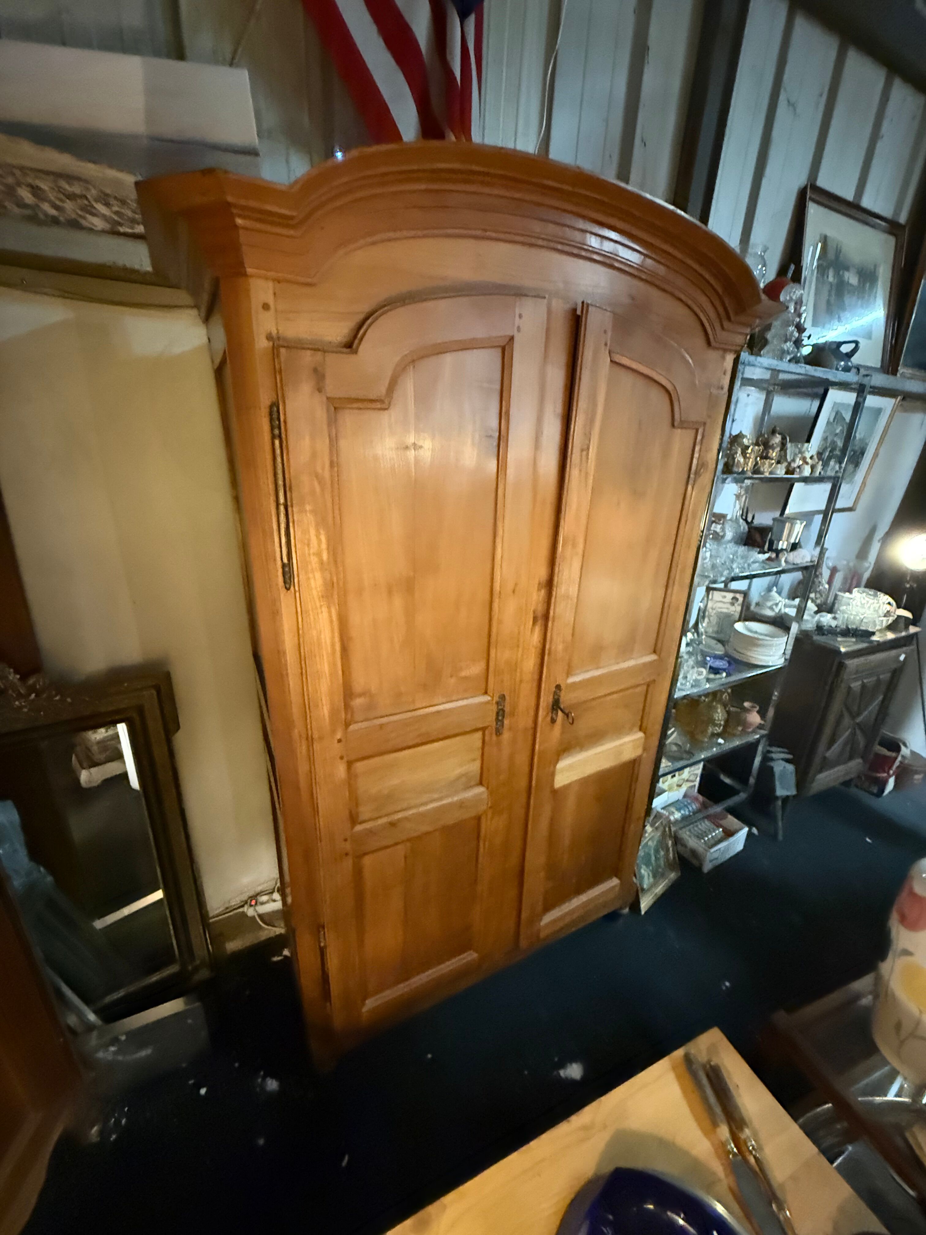 Louis XV wardrobe with a gendarme hat.