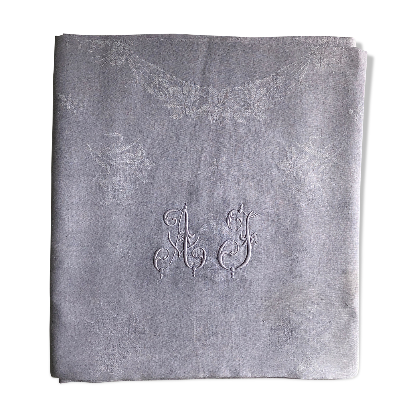 Old linen tablecloth and lilac-tinted silk