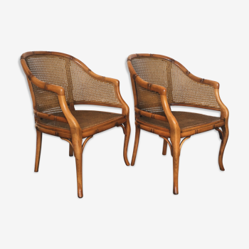 Pair of wooden and cannage armchairs