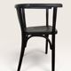 Curved black lacquered wooden armchair in Thonet style
