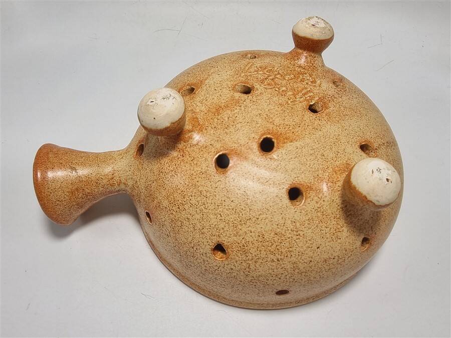 Ceramic colander
