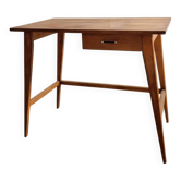 Vintage desk with tapered legs.