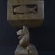 Togolese ethnic stool in carved exotic wood.