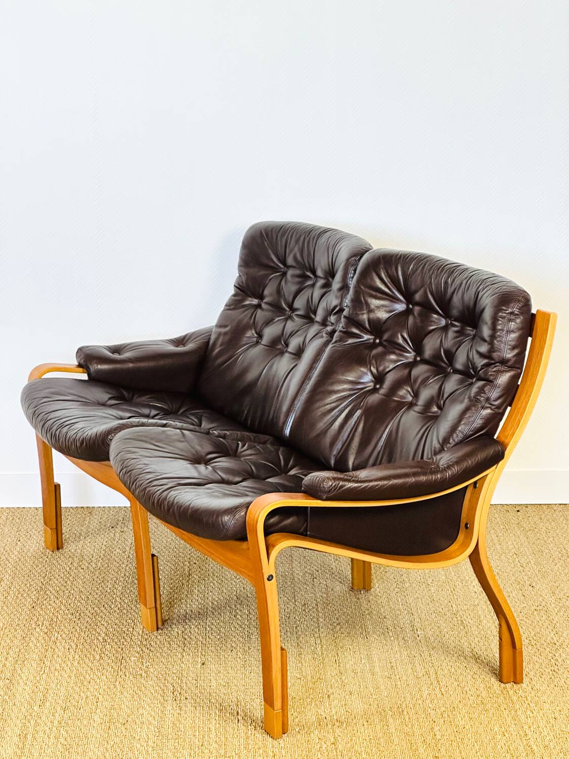 Scandinavian leather and teak bench from the 1960s.