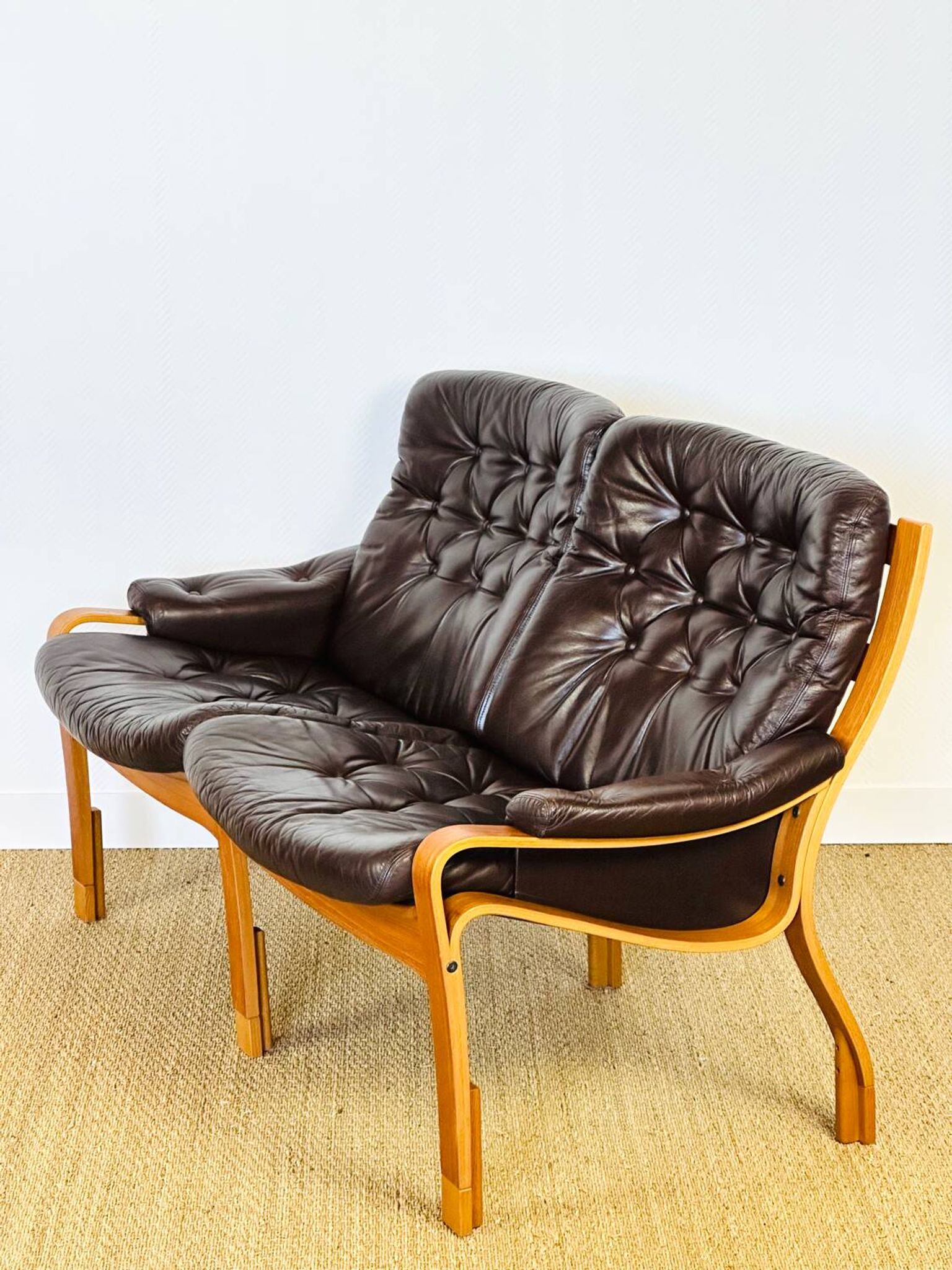 Scandinavian leather and teak bench from the 1960s.