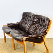 Scandinavian leather and teak bench from the 1960s.