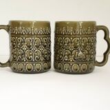 Duo of BP 70's slip mugs