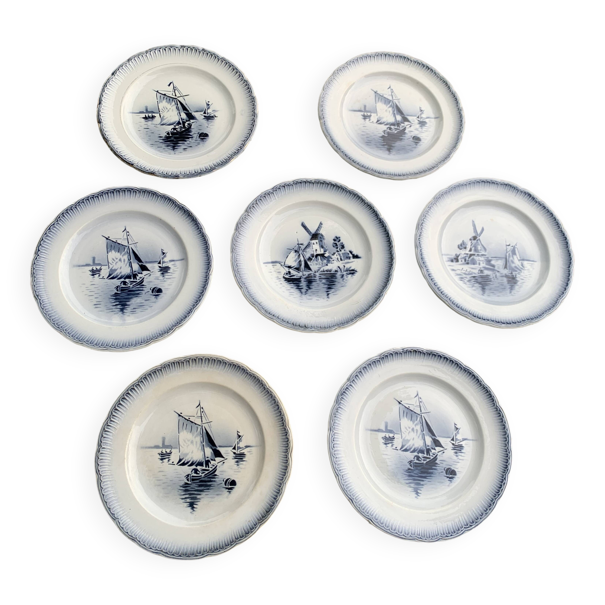 Set of 7 small dessert plates, Saint Amandinoire, Saint Amand decorated with sailboats