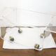 Table basse en plexi thermoformé transparent, sur roulettes
