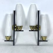 Mid-Century pair of double lights sconces in brass and opaline glass. Italy 1950s