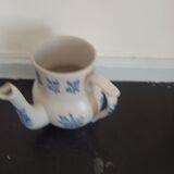 Earthenware pourer of St Uze old floral decoration