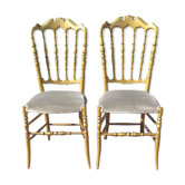 Paire de chaises en bois doré dites " elisée "
