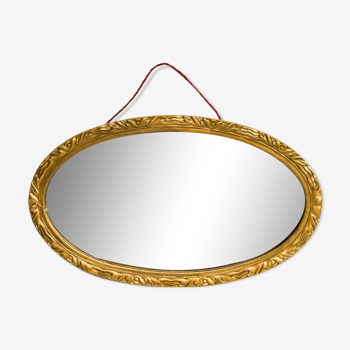 Mirror with old vintage frame in gold and oval shape 60 x 36 cm