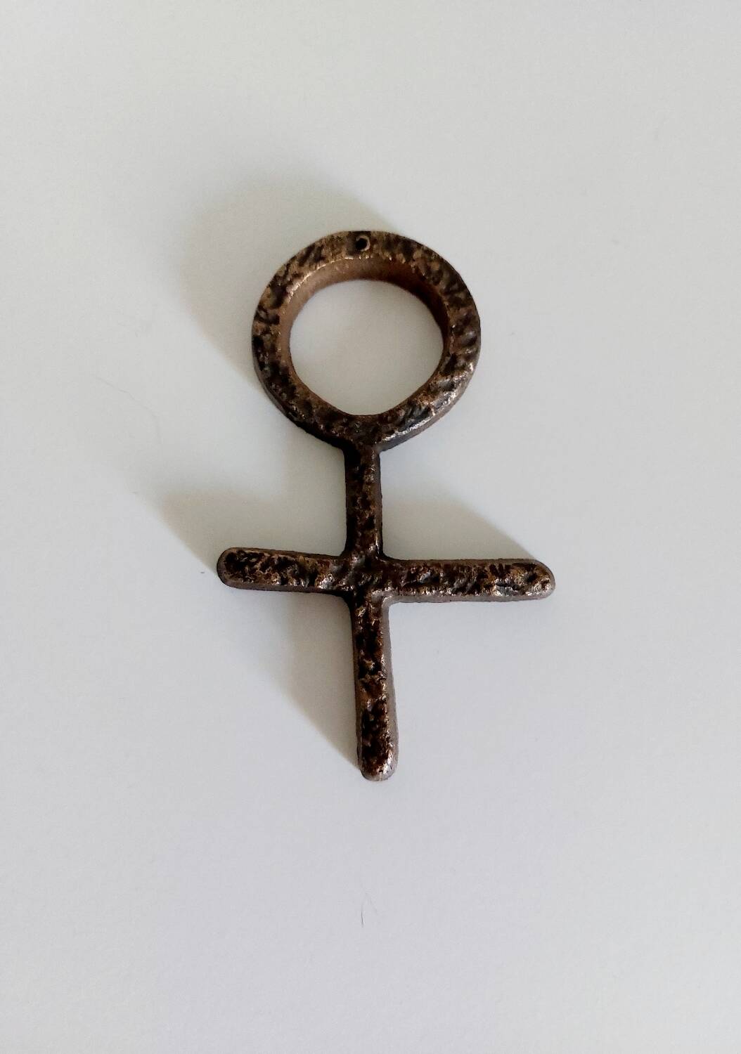 Bronze Venus symbol