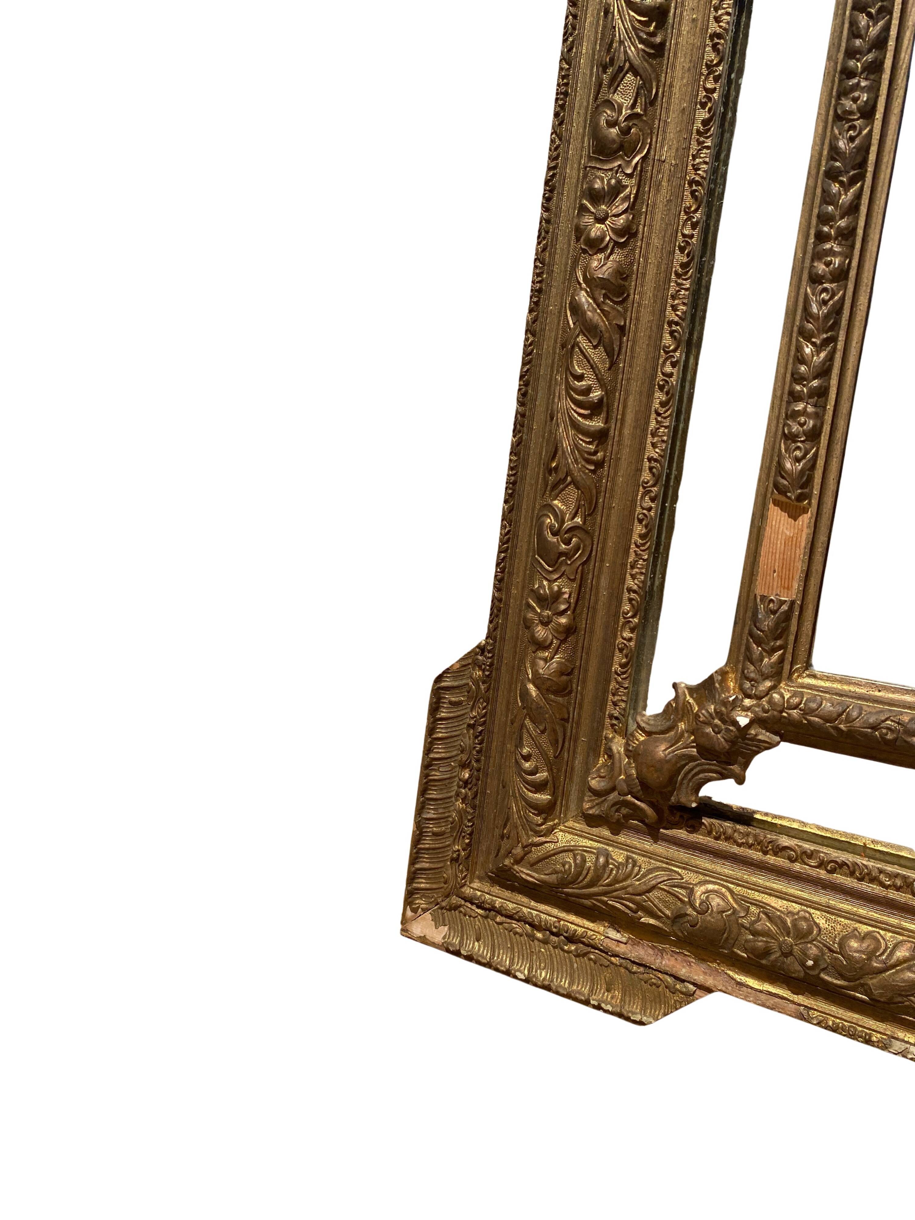 Louis XVI style mirror with glazing beads in gilded wood - 19th century