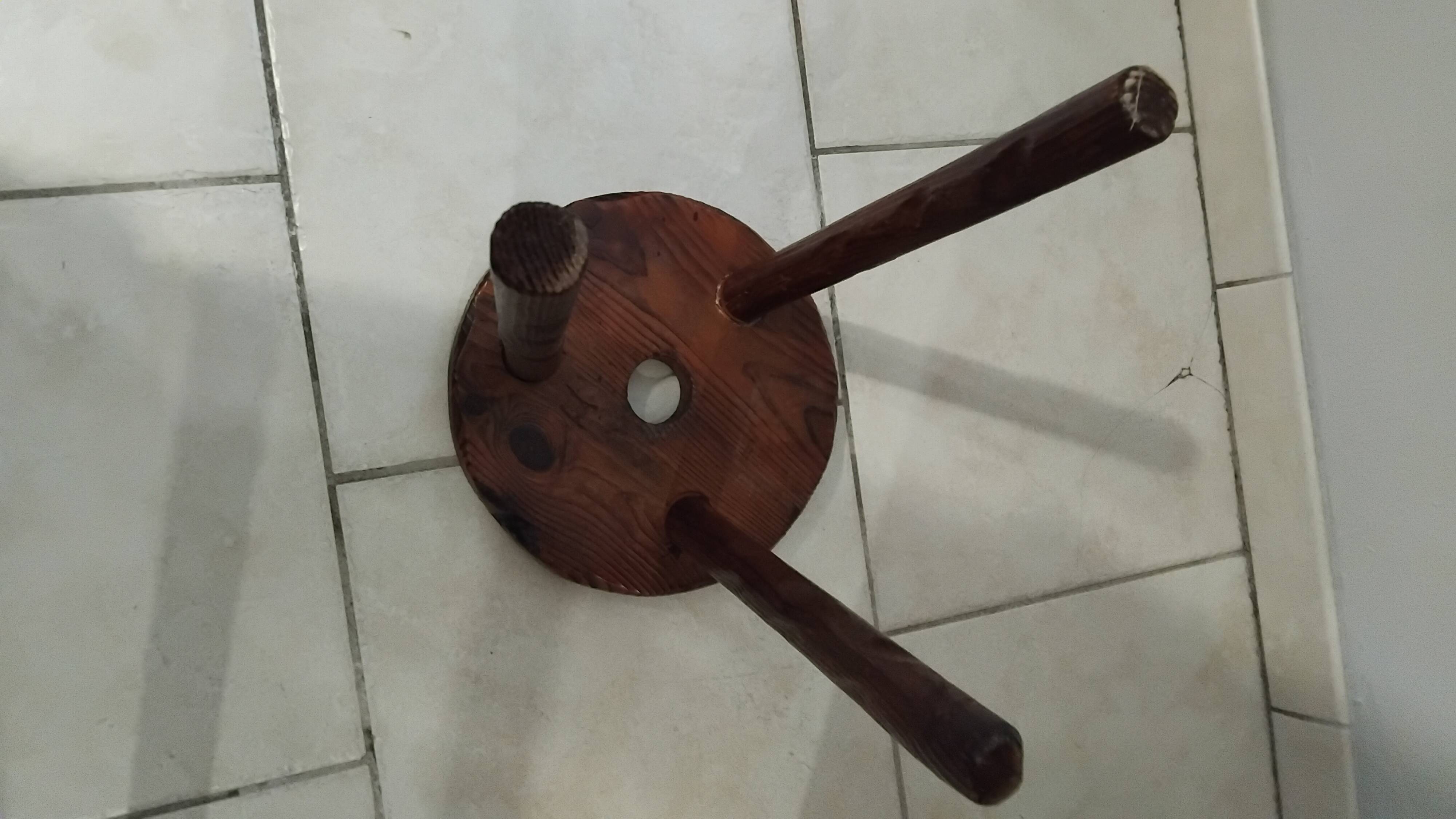 Vintage wooden perforated stool