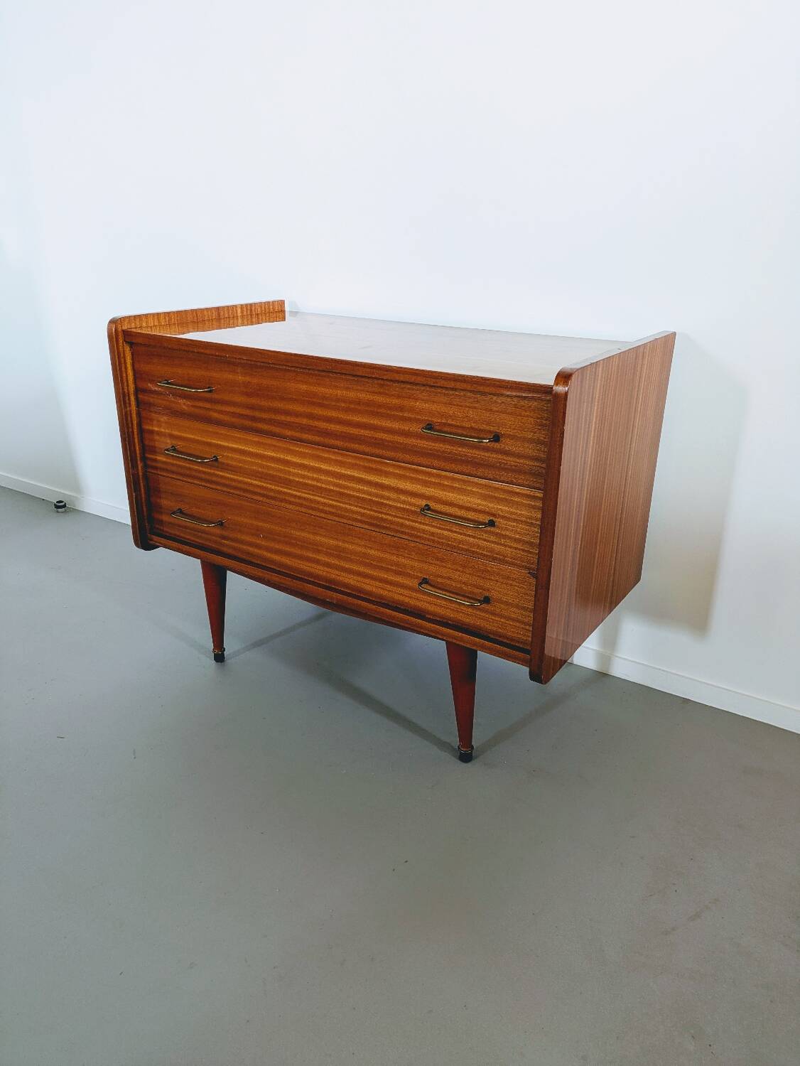 Vintage wooden chest of drawers in Scandinavian style