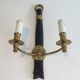 Pair of Black Lacquered Bronze Wall Lights with Lion Head Decorations