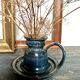 Enameled stoneware candle holder