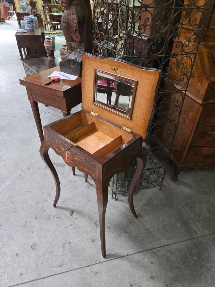 work table from the Napoleonic III era with marquetry of scrolls and patterns