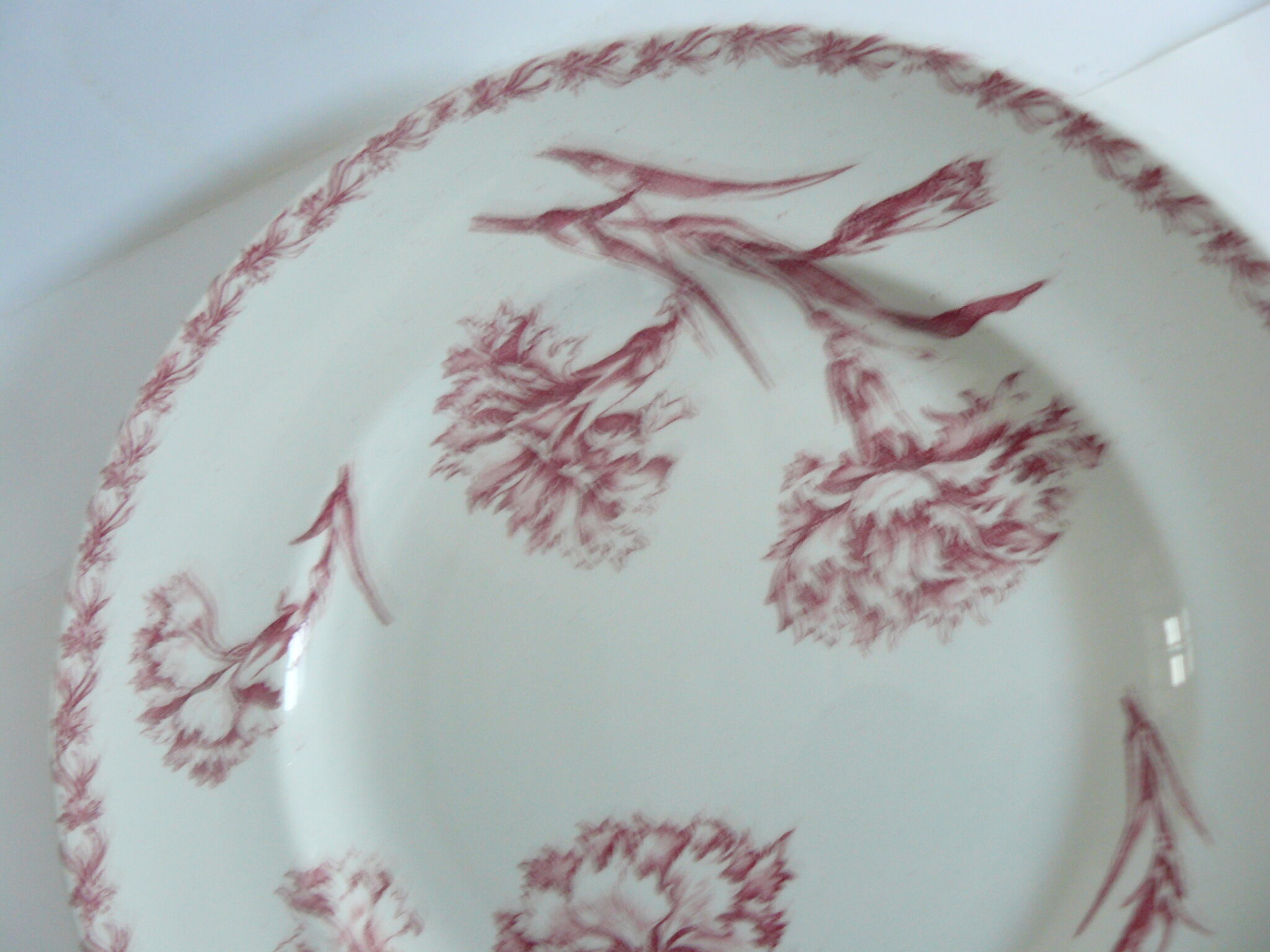 Round plate iron earth model "carnation" of Lunéville