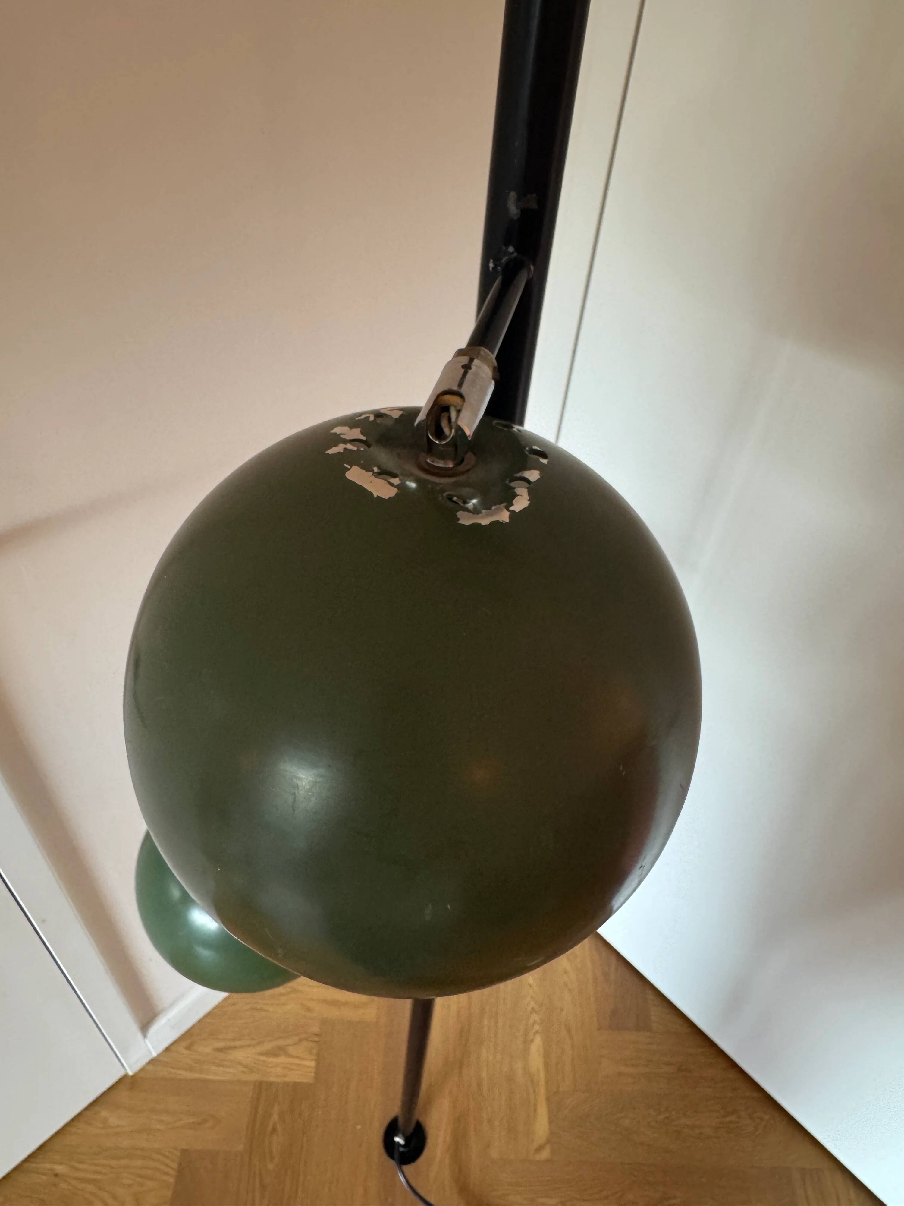 Three-headed "eyeball" floor-to-ceiling lamp, mid-century modern.