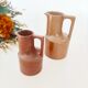 Signed sandstone pitcher