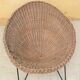 Fauteuil vintage en rotin pieds métal