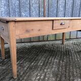 Antique solid cherry farmhouse table with 3 drawers and 1 pull out.