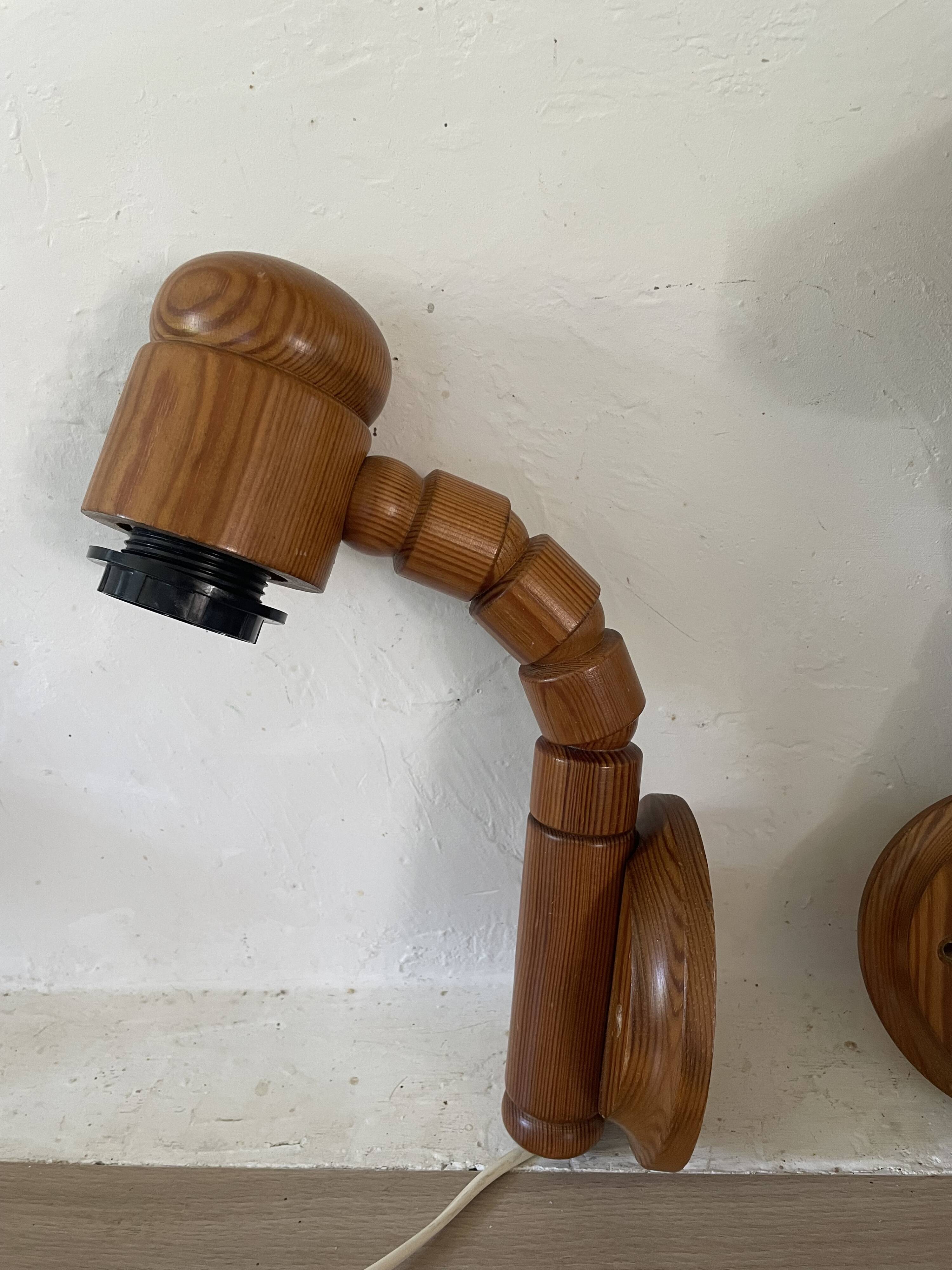 Pair of articulated Scandinavian wall lights SOLBACKEN in vintage wood