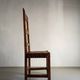 2 brutalist carved wood dining chairs with leather seat | The Netherlands | 1970s