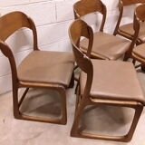 Following 5 chairs "sled" Baumann