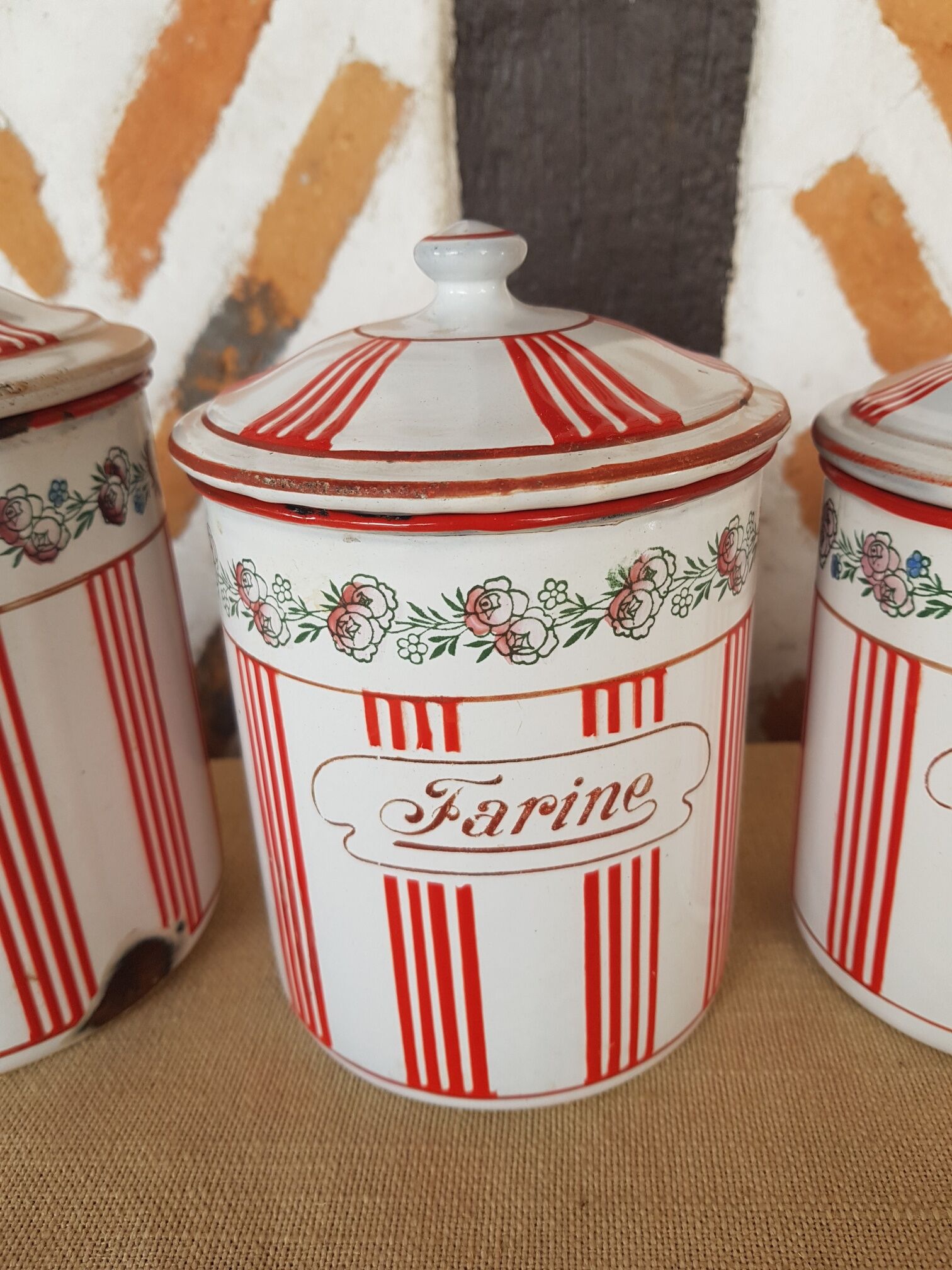 Old series of enamelled sheet metal spice pots