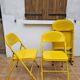 Ensemble de six chaises en métal pliantes jaunes Eurosit
