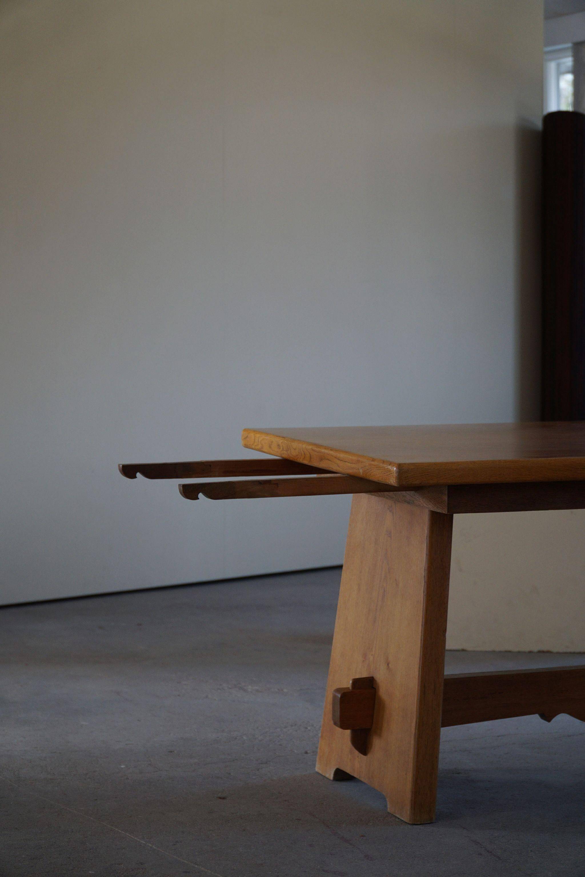 Mid-century brutalist dining table, made of oak, Danish craftsmanship, 1950s.
