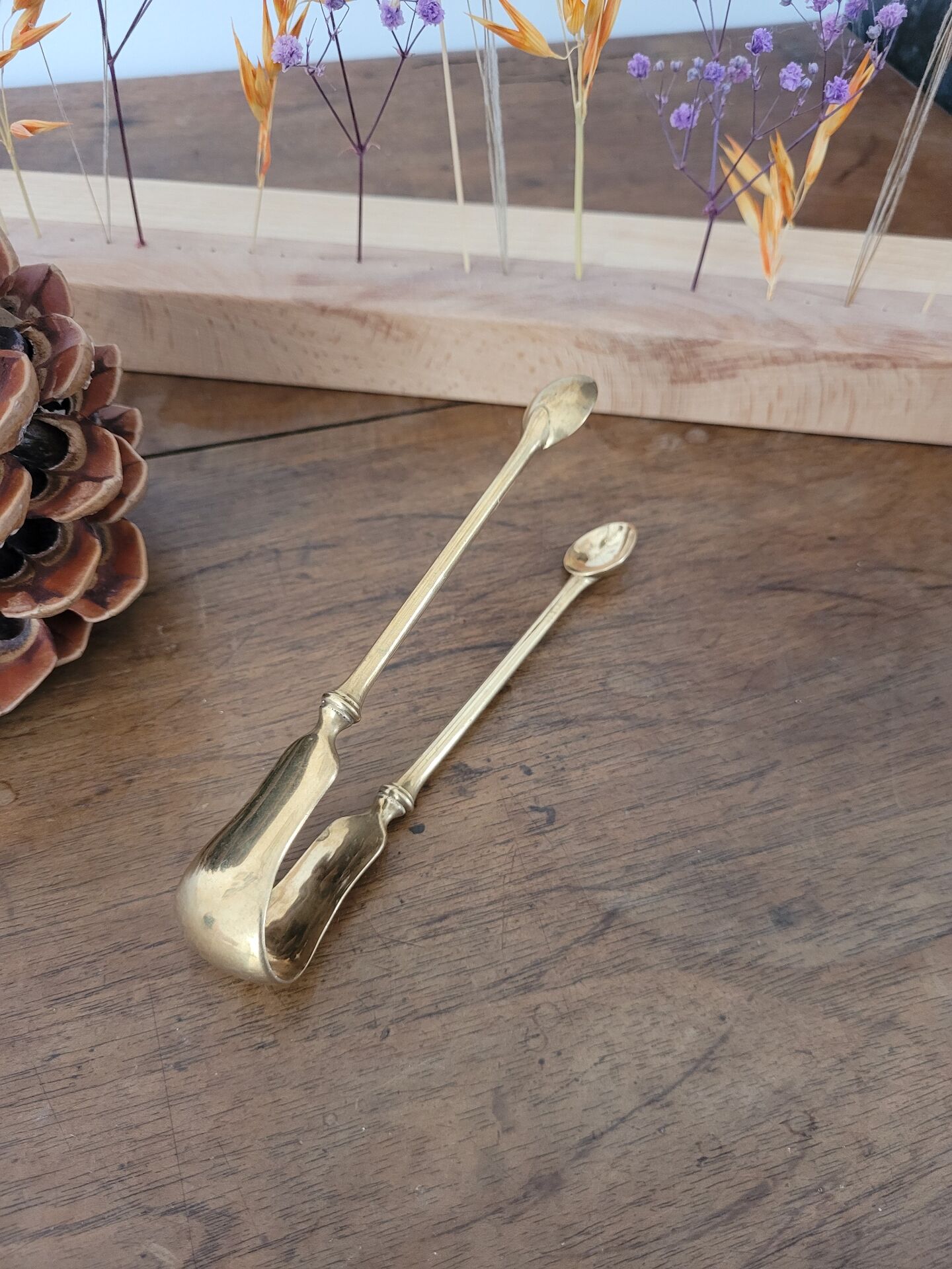Golden metal sugar tongs