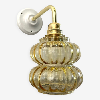 Vintage wall lamp in gilded chiseled glass