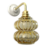 Vintage wall lamp in gilded chiseled glass