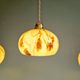 Trio of Art Deco pendant lights in marbled opaline glass, 1920s-30s