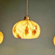 Trio of Art Deco pendant lights in marbled opaline glass, 1920s-30s