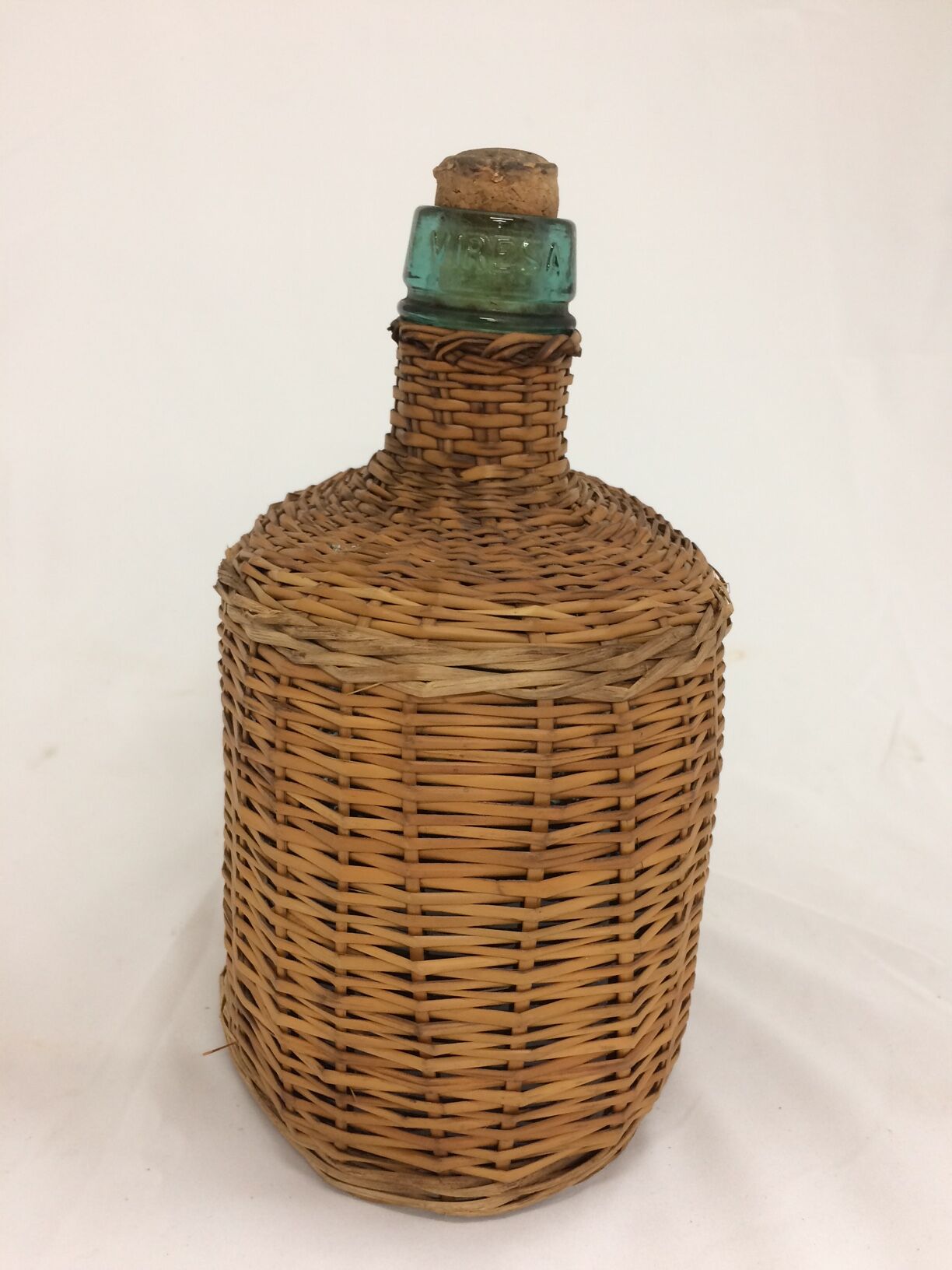 Former demijohn in wicker