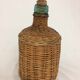 Former demijohn in wicker