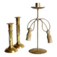 Trio of vintage knotted candlesticks brass