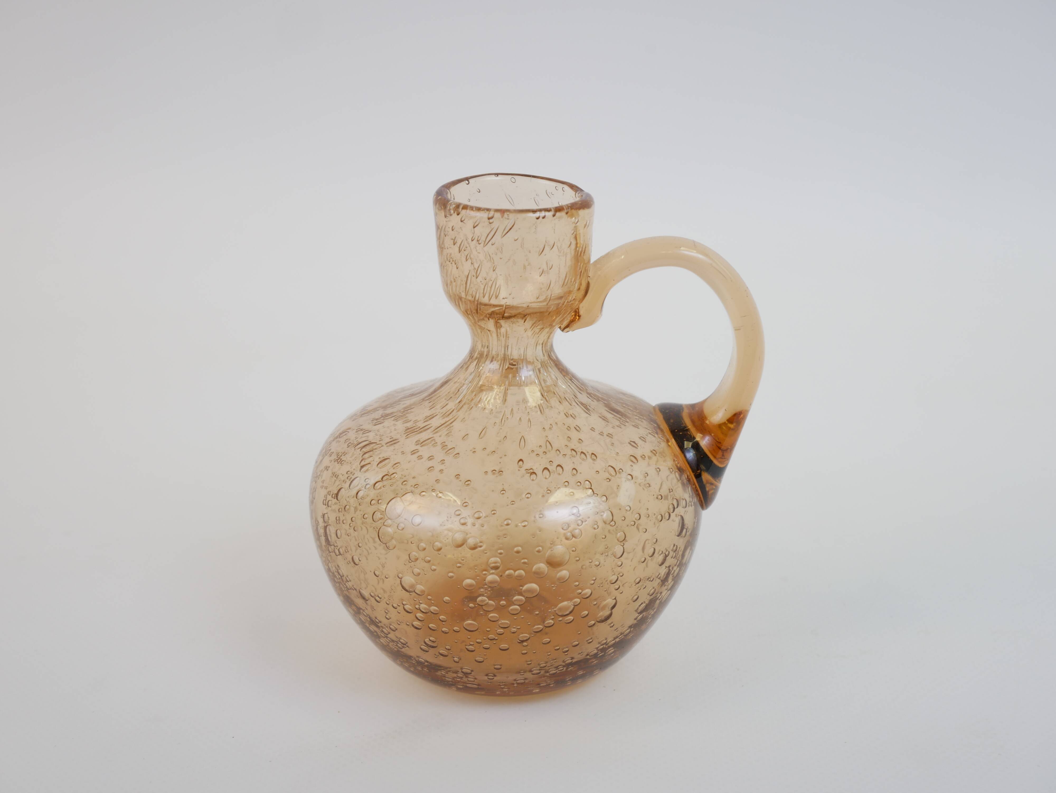 Petit porte bougie en verre bullé rose de Biot