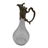 Large balloon glass carafe with pewter frame.